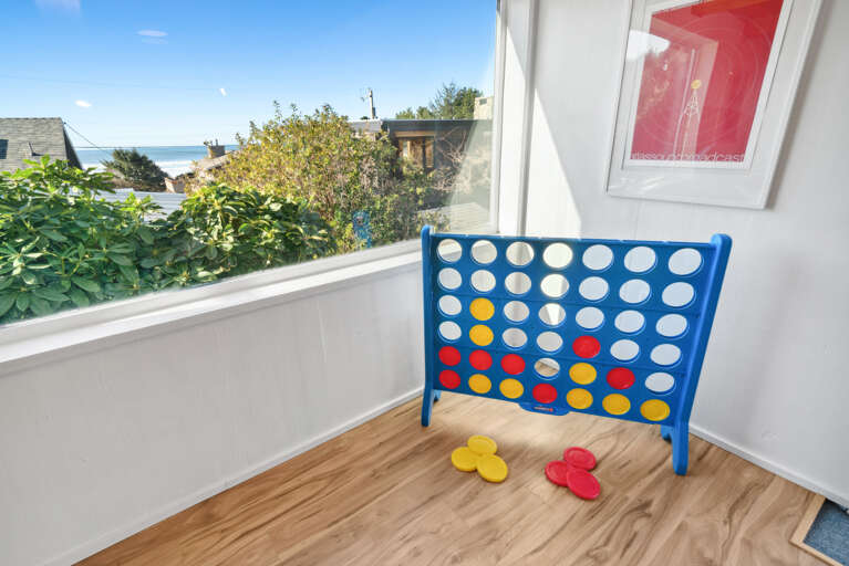 Game room with Arcade games, atari, Xbox, guitar hero, foosball, big connect four and more