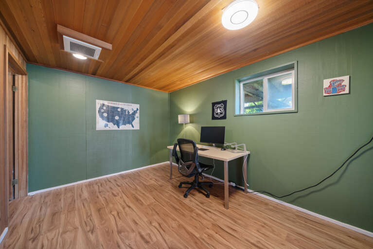 Office with large desk and private bath. 