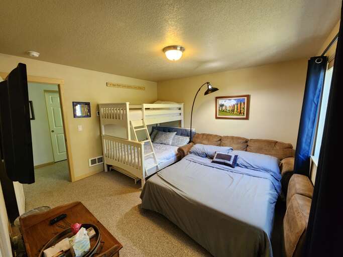 Bunk room with Sleeper sofa