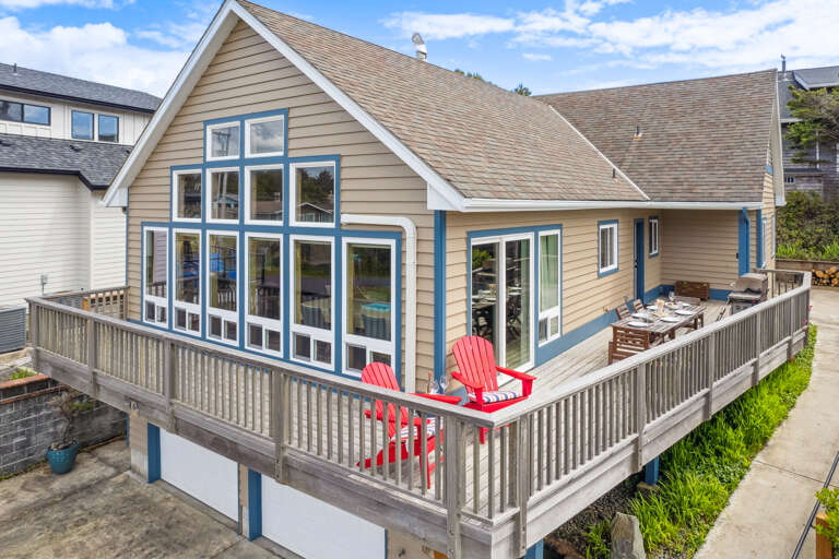 Ocean View deck on main level with outdoor seating and Gas BBQ.
