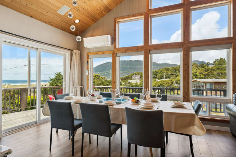 Open living space with newly remodeled kitchen, living room with Smart TV, streaming only, dining room. All with ocean views. Access to deck with outdoor seating and Gas BBQ. 