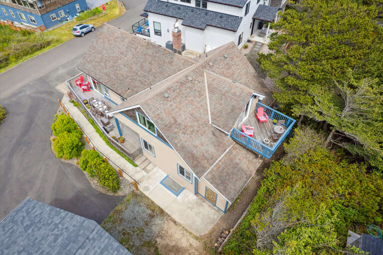 Aerial view. 3 story 5 bedroom/3 bath. Parking for 4 vehicles. 