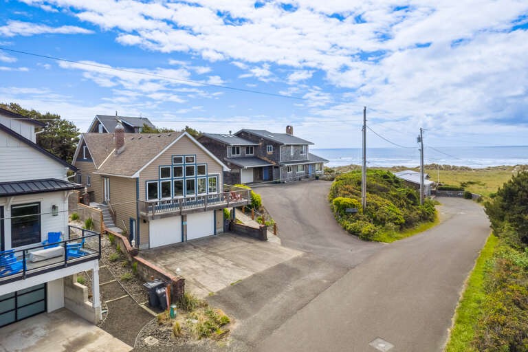 Aerial view. 3 story 5 bedroom/3 bath. Parking for 4 vehicles. 