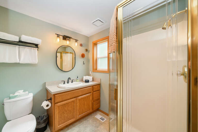 master bath with separate walk in shower and tub