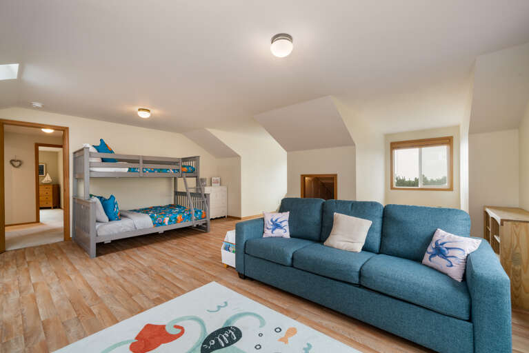 Bunk room with Double/Twin Bunk and queen hideabed, Ocean view, children's cubby playroom, Roku TV/DVD player. Games and books.