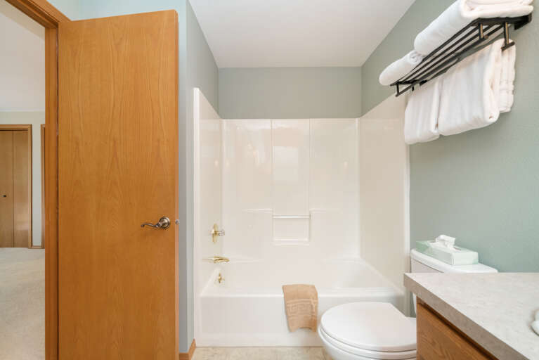 Master bath with separate walk in shower and tub