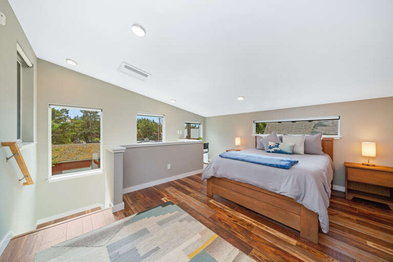  Family suite bedroom with Queen and double bunk beds with private bath with shower/tub combo. Office work space. Electric black out blinds.