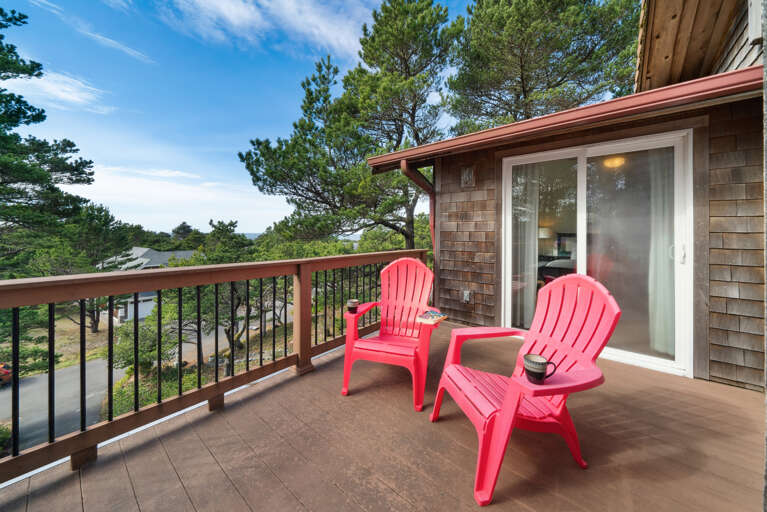 Upper deck with picnic table, adirondak chairs and Gas BBQ