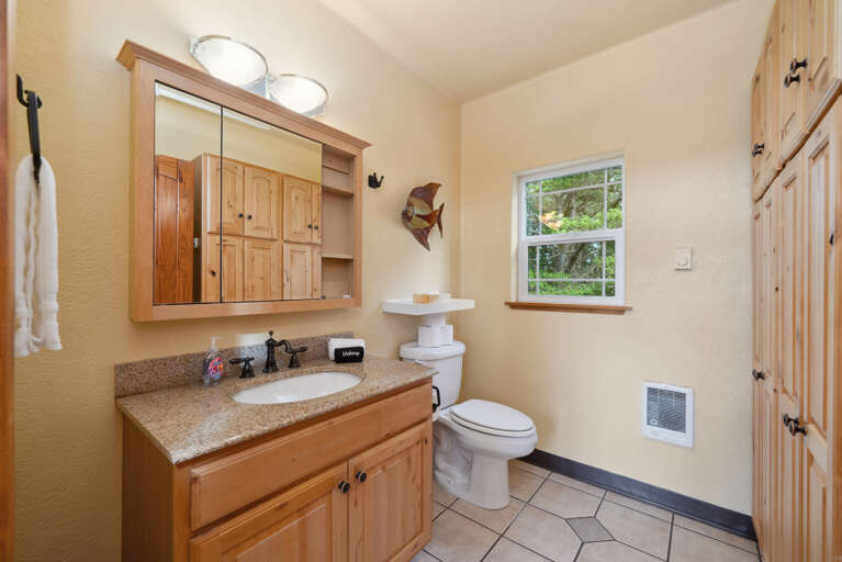 3rd floor half bath near living area.