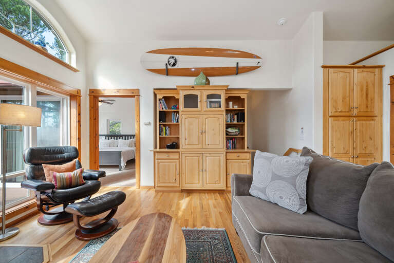 Open living space with, Living room with Gas fireplace, Roku TV, dining room, fully equipped kitchen and access to upper deck. 