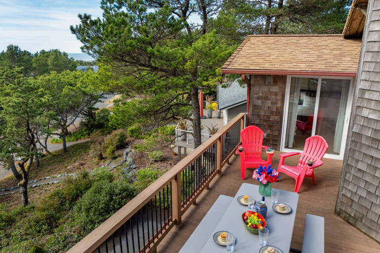 Upper deck with picnic table, Adirondack chairs and Gas BBQ