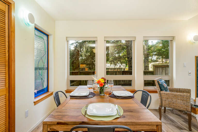 Dining room open to living room with fireplace, TV, queen sofa bed, full bath with walk in shower.  Dining room open to living room with fireplace, TV, queen sofa bed, full bath with walk in shower.