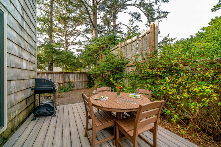 Fenced yard with side deck, gas BBQ (seasonal only) with outside dining table. Fenced yard with side deck, gas BBQ (seasonal only) with outside dining table.