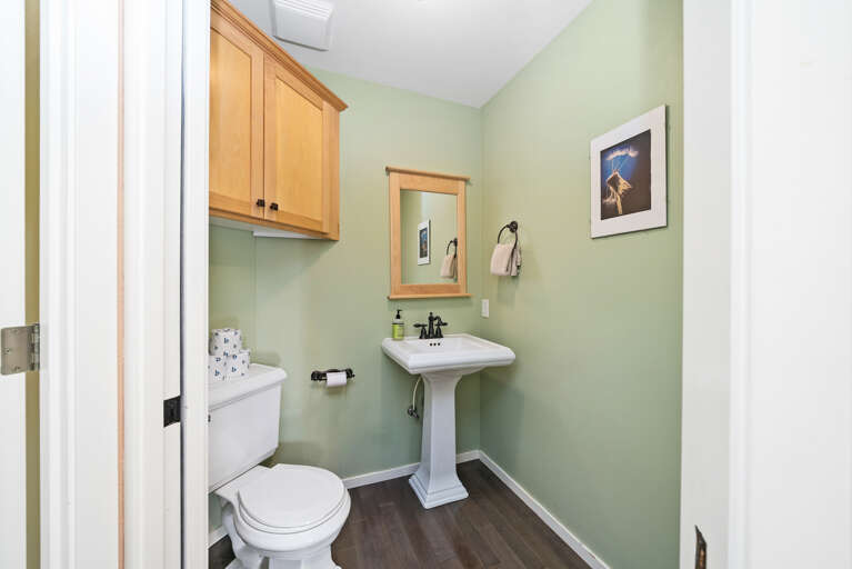 Half bath in downstairs hallway