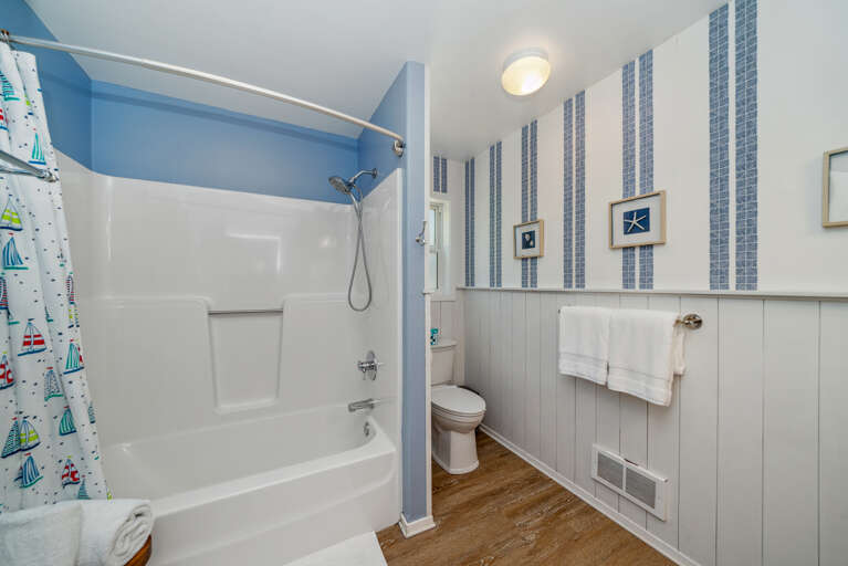 Downstairs full bath with tub and shower combo