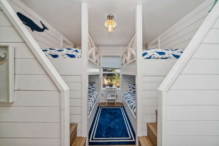 Kids bunk room with 2 sets of bunks