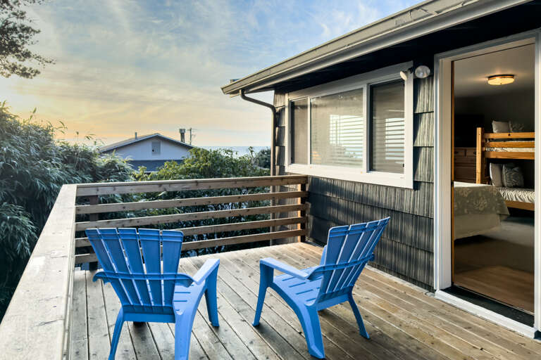 Private deck off of the main floor second bedroom with the queen bed and a set of bunk beds. Ocean View  Private deck off of the main floor second bedroom with the queen bed and a set of bunk beds. Ocean View