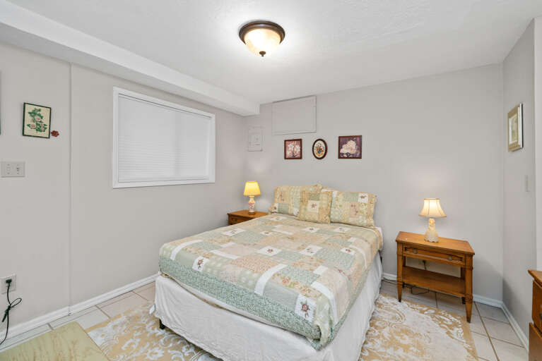 Downstairs double bed room off of the foosball room.  Downstairs double bed room off of the foosball room.