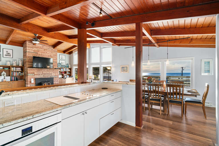 Full kitchen open to dining and living area Full kitchen open to dining and living area