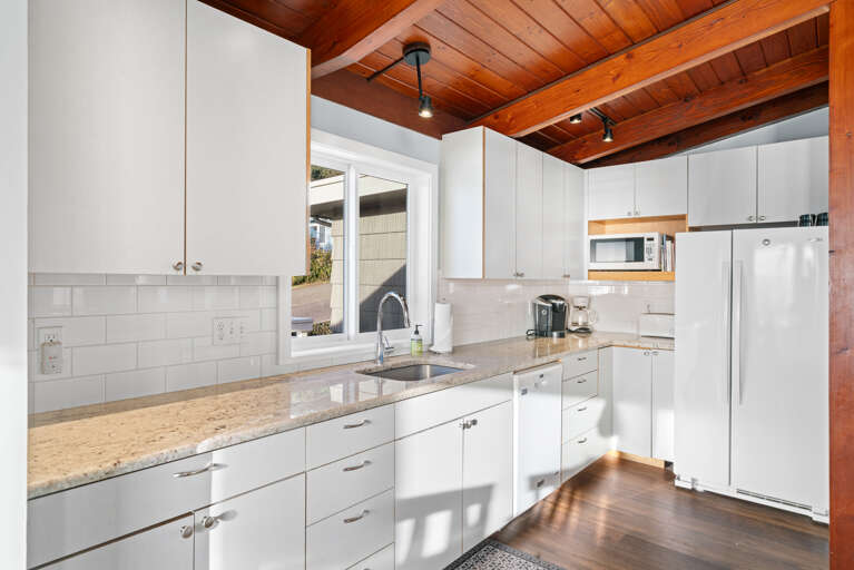 Full kitchen open to dining and living area Full kitchen open to dining and living area