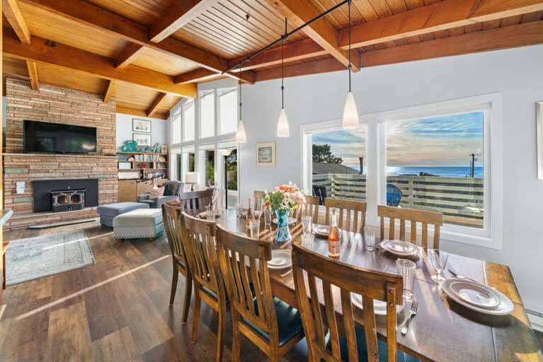 Dining area with ocean view open to living room and kitchen Dining area with ocean view open to living room and kitchen