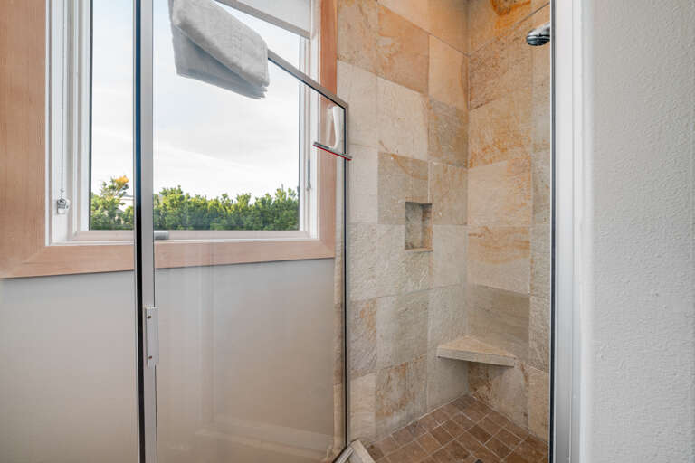 Main floor bathroom with walk in shower.  Main floor bathroom with walk in shower.