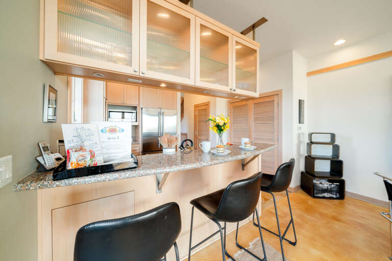 Ocean view fully equipped kitchen with breakfast bar, gas range, dishwasher, full fridge and microwave.  Ocean view fully equipped kitchen with breakfast bar, gas range, dishwasher, full fridge and microwave.