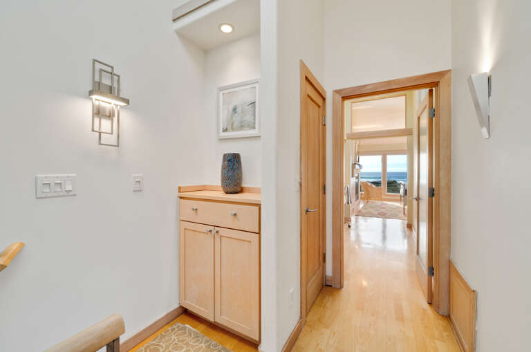 Upstairs hall way with access to master bath with jacuzzi tub and 3rd bath with walk in shower.  Upstairs hall way with access to master bath with jacuzzi tub and 3rd bath with walk in shower.