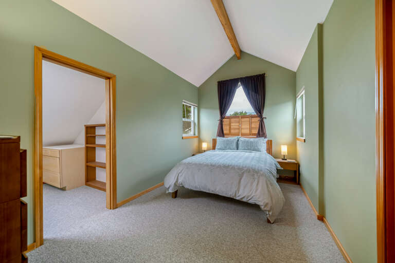 Family suite with Queen bedroom with a twin and trundle bed addition in alcove