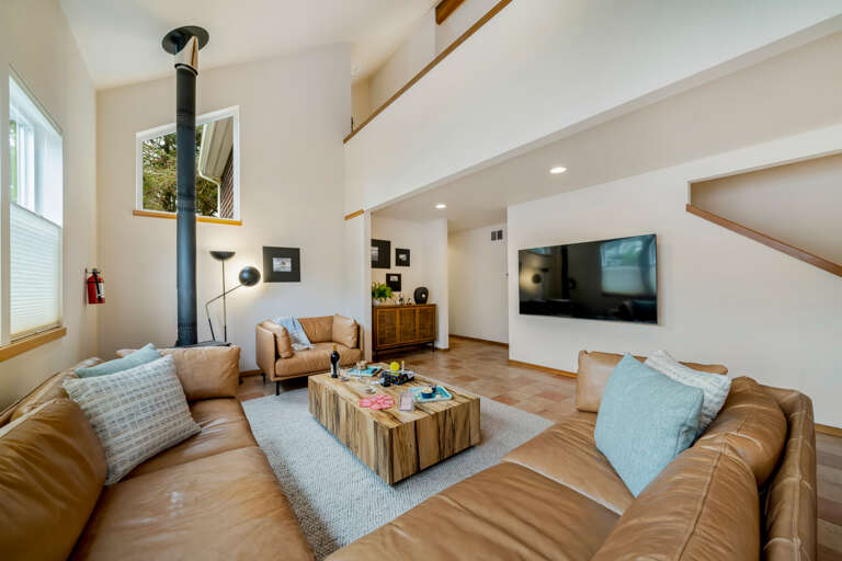 Large TV for streaming and comfy couch for relaxing 