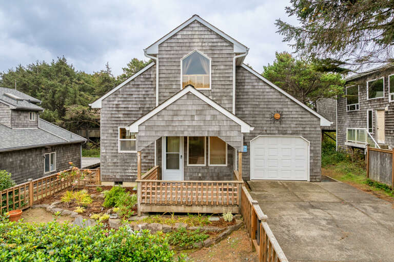 Front entrance view. Just a short walk to the sand