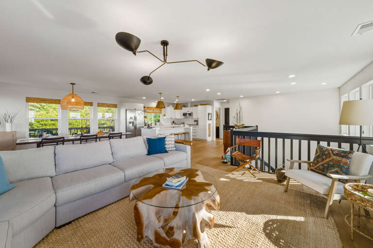 Open living space with comfy furniture to snuggle on while watching your favorite show on streaming TV with the gas fireplace giving you great atmosphere.