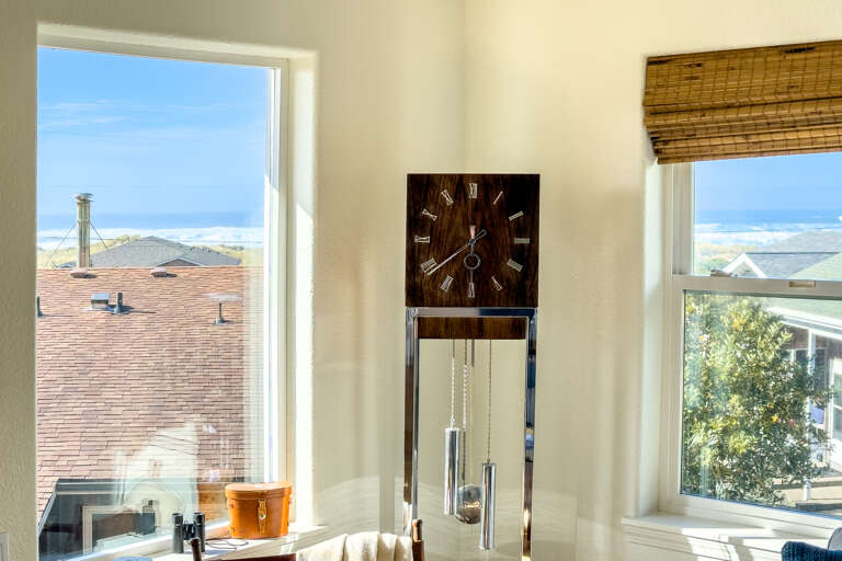 Living room Ocean view windows. Open livng space with kitchen and dining room.