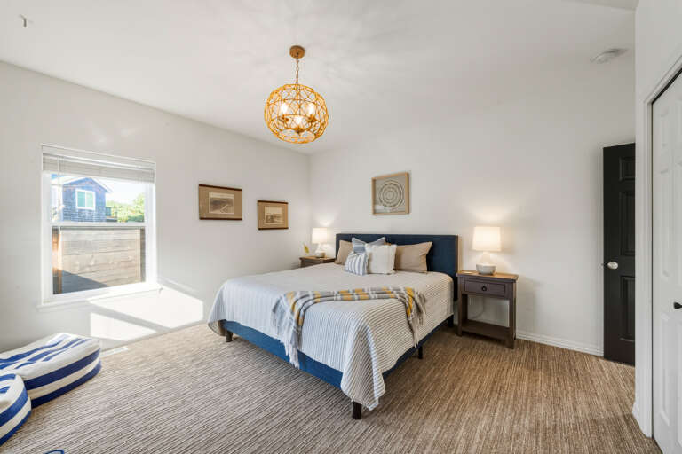 Lower level King bedroom with large closets, futon for additional sleeping. 