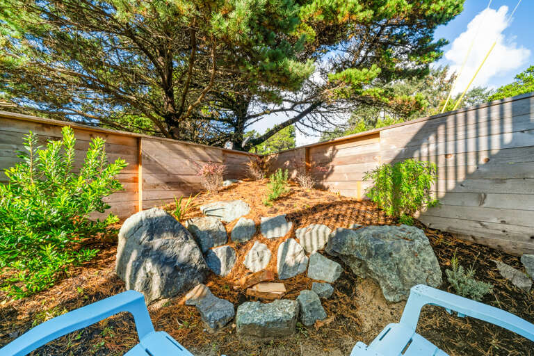 Outdoor firepit built into the landscape