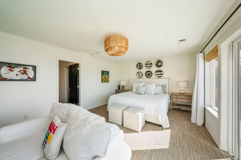 Master bedroom with King bed, private deck, full bath with walk in shower and jetted tub. 