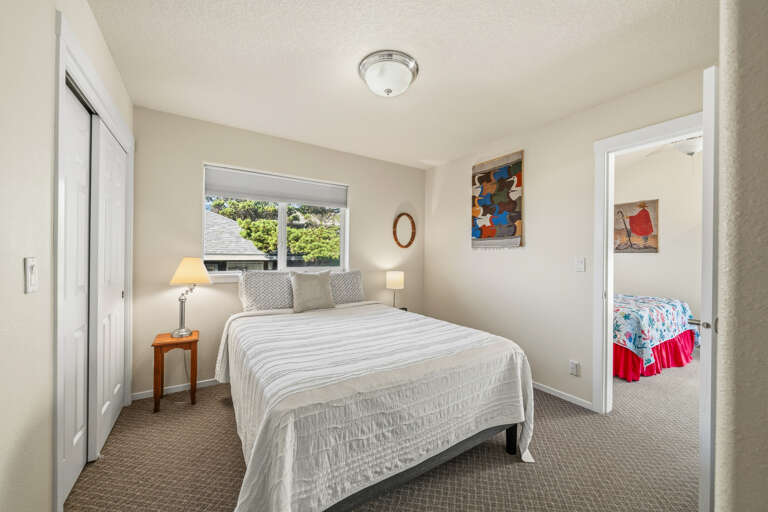 Family suite with Queen bed and access to the King bedroom. The King bedroom has an access door that leads to the back deck are 