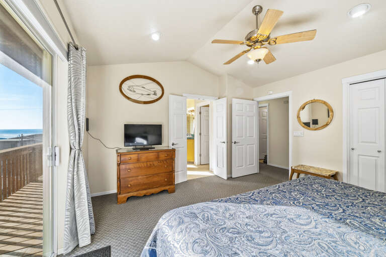 Master bedroom with king bed, and master bath with jetted tub and walk in shower. 