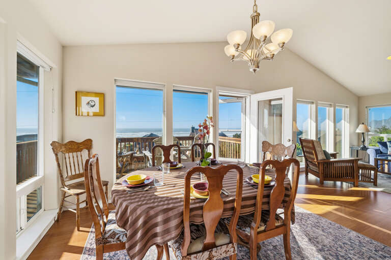 Open living space including dining room with ocean view. 
