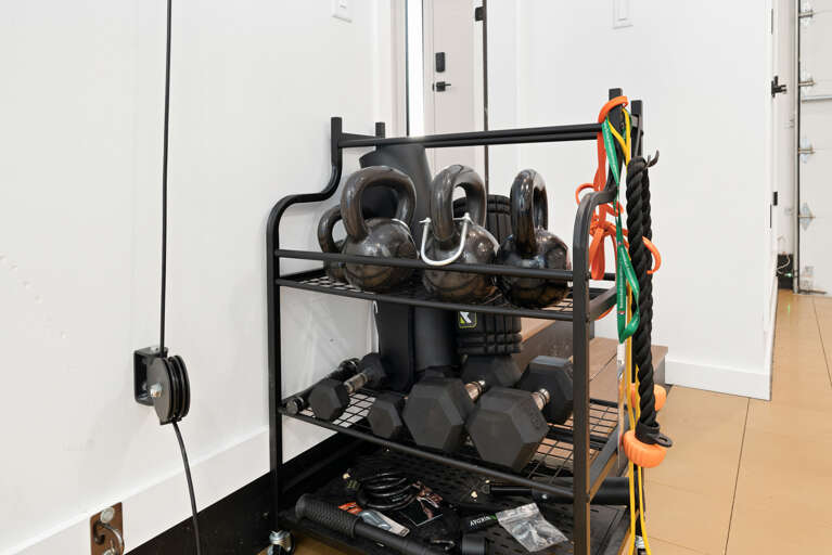 Free weights and pully system. Exercise mats and indoor basket ball court. 