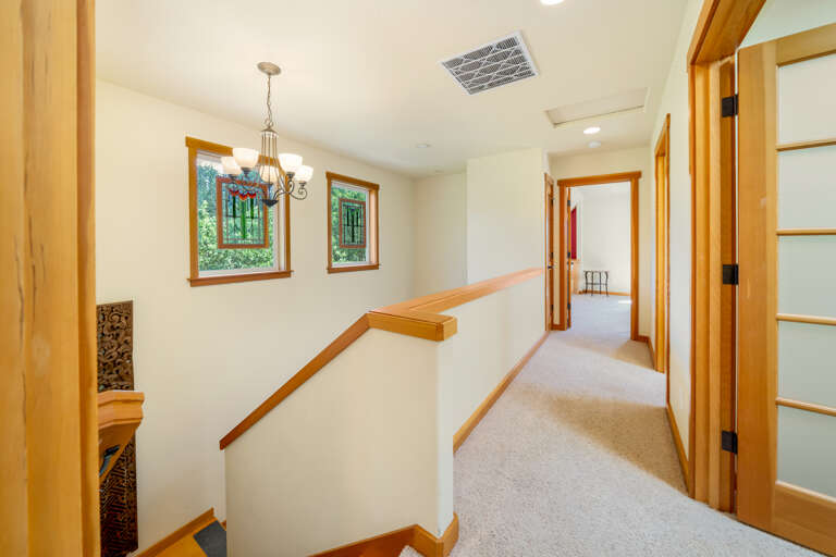 Upstairs with King and twin room, Queen Room, and family room with TV, Playstation 3, Sofa bed. 