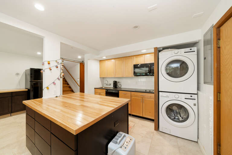 Downstairs fully equipped Kitchen and laundry area