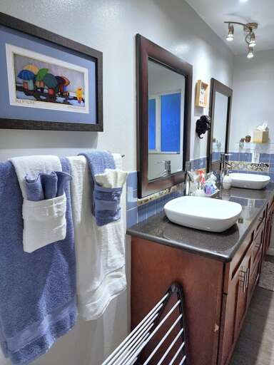 Upstairs hallway bathroom has dual-sinks, a private toilet... Upstairs hallway bathroom has dual-sinks, a private toilet...