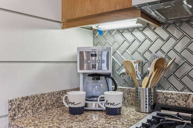 Welcome to our charming kitchen, featuring modern appliances and beautiful countertops! Start your day with a freshly brewed coffee from our top-of-the-line coffee machine, and enjoy meals in the cozy dining nook. Perfect for culinary adventures! Welcome to our charming kitchen, featuring modern appliances and beautiful countertops! Start your day with a freshly brewed coffee from our top-of-the-line coffee machine, and enjoy meals in the cozy dining nook. Perfect for culinary adventures!