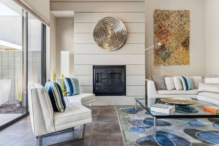 Step into style! This artistic modern living room seamlessly flows to the courtyard and pool, creating an inviting space for relaxation and fun. ️ Enjoy outdoor dining in total privacy. Marvel at the handmade newspaper woven art piece. ️ Step into style! This artistic modern living room seamlessly flows to the courtyard and pool, creating an inviting space for relaxation and fun. ️ Enjoy outdoor dining in total privacy. Marvel at the handmade newspaper woven art piece. ️
