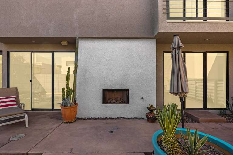 Cozy up by the outdoor fireplace next to the pool! This inviting spot features comfortable seating, perfect for evening chats or a nightcap. Enjoy the warm glow and tranquil ambiance as you relax under the stars—your perfect retreat awaits! Cozy up by the outdoor fireplace next to the pool! This inviting spot features comfortable seating, perfect for evening chats or a nightcap. Enjoy the warm glow and tranquil ambiance as you relax under the stars—your perfect retreat awaits!