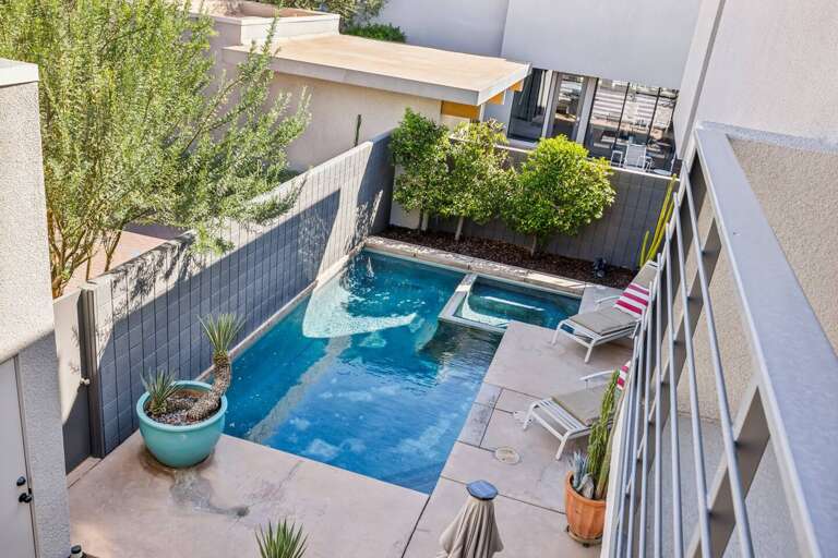 Take a dip in paradise! ♀️☀️ This stunning overhead view showcases your private pool oasis, surrounded by lush landscaping and sun loungers. Perfect for soaking up the sun or enjoying a refreshing swim. Your dream getaway starts here!  Take a dip in paradise! ♀️☀️ This stunning overhead view showcases your private pool oasis, surrounded by lush landscaping and sun loungers. Perfect for soaking up the sun or enjoying a refreshing swim. Your dream getaway starts here!