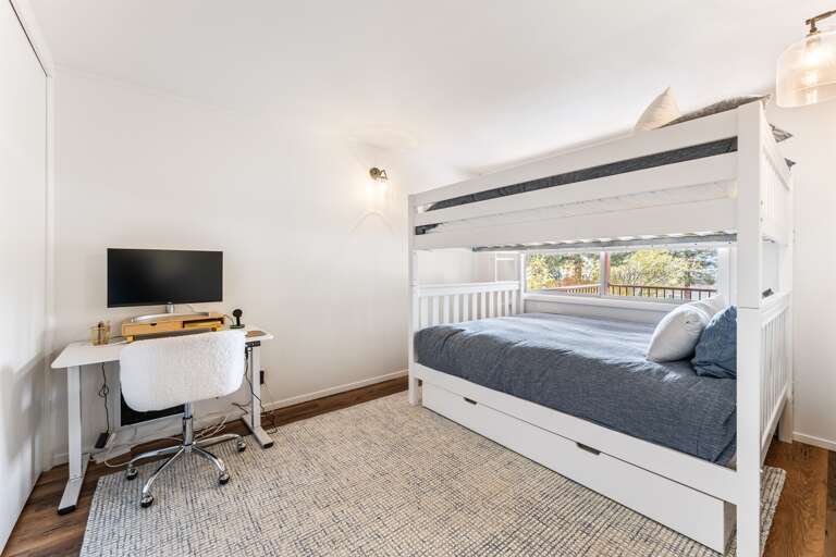 Bunk Room - Located on the first floor with a queen over queen bunk bed and full size trundle bed