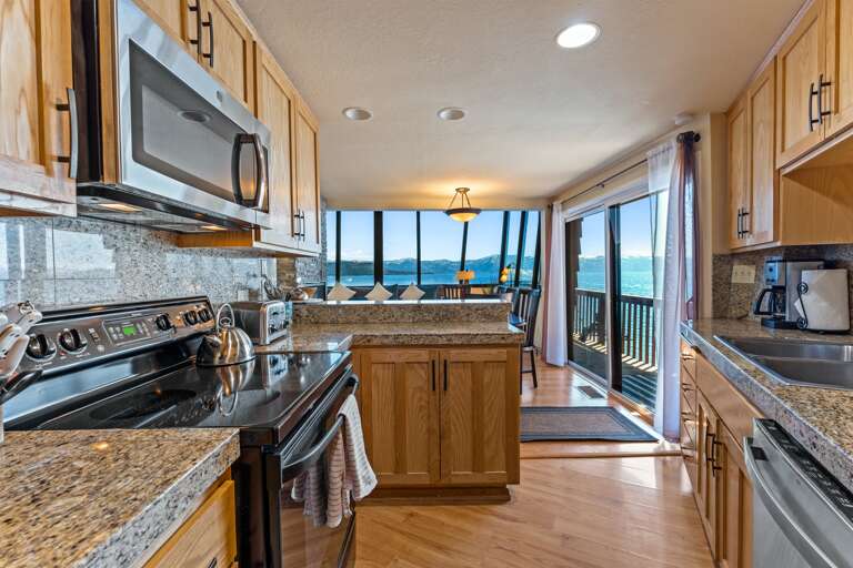 Enjoy cooking meals while taking in the breathtaking views of Lake Tahoe. Essentials like paper towels, dish soap, dishwasher pods, a fresh sponge, trash bags, and recycling bags are provided. A variety of spices are available, though specific items are n