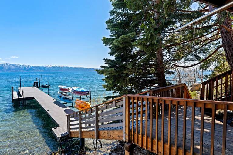Private pier with kayaks and paddleboards available for guest use